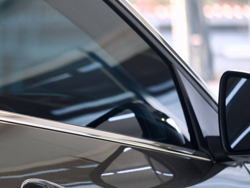 Automotive window film tinting